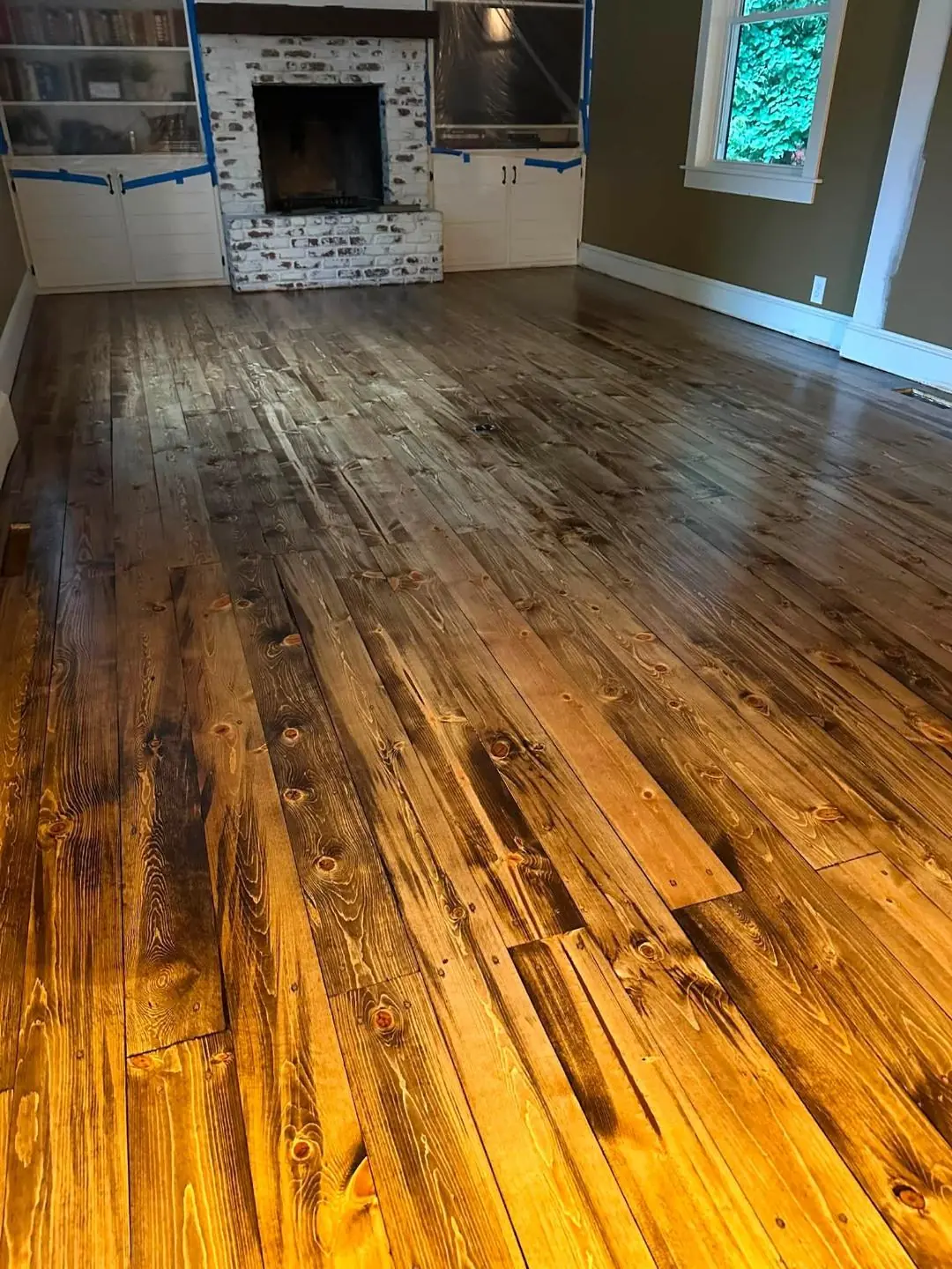 Freshly refinished hardwood floor with a satin finish